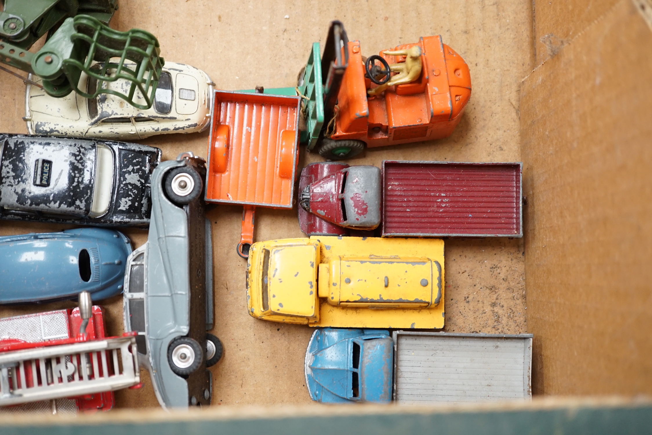 Twenty-two Dinky Toys mostly for restoration, including a Car Carrier (984), Missile Erector, Missile Servicing Platform, Spectrum Pursuit Vehicle, Thunderbird 2 containing Thunderbird 4, Rolls-Royce Silver Wraith, etc.